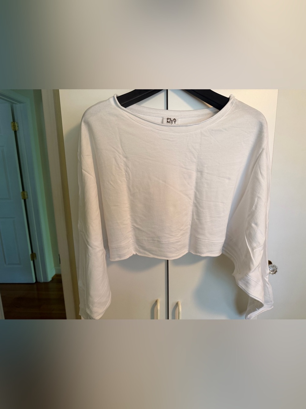 Planet White Cropped Long Sleeve Shrug